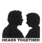 HEADS TOGETHER